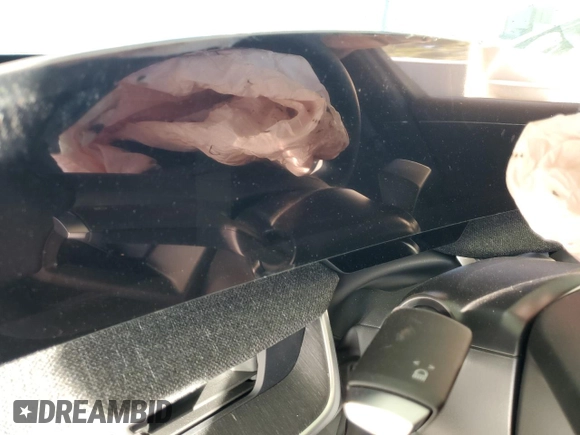 2024 Lucid Air Pure z VIN 50EA1PGA7RA001741, wystawiony jako Copart lot #79933954 z przebiegiem Nie podano mil oraz Szkoda całkowita • Salvage title. Historia ofert i sprzedaży dostępna na DreamBid. Obrazek 9.