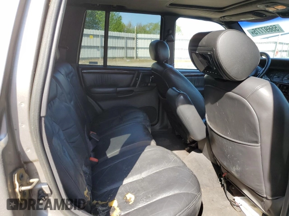 1998 Jeep Grand Cherokee Limited z VIN 1J4GZ88Z1WC231772, wystawiony jako Copart lot #55697775 z przebiegiem 178 896 mil mil oraz Czysty tytuł • Clean title. Historia ofert i sprzedaży dostępna na DreamBid. Obrazek 11.