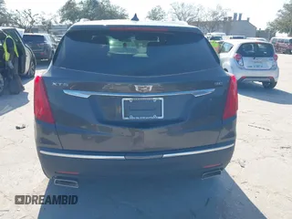 2019 Cadillac XT5 FWD with VIN 1GYKNARS5KZ143510, listed as a IAAI auction lot 41553279 with 53,943 mi miles and . Bid and sale history available at carsss.com. Image 16.