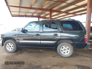 2004 GMC Yukon SLT with VIN 1GKEC13V94J125366, listed as a IAAI auction lot 42089017 with 287,827 mi miles. Bid and sale history available at carsss.com. Image 14.