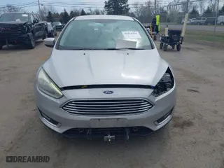 2015 Ford Focus Titanium with VIN 1FADP3N27FL228549, listed as a IAAI auction lot 41912941 with 69,025 mi miles. Bid and sale history available at carsss.com. Image 12.