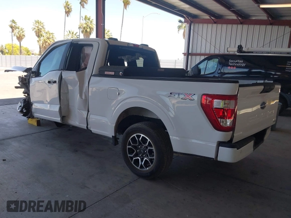 2023 Ford F-150 XL with VIN 1FTEX1CP1PKE18310, listed as a IAAI auction lot 42337133 with 26,931 mi miles and . Bid and sale history available at DreamBid. Image 3.