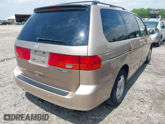 2000 Honda Odyssey EX with VIN 2HKRL1868YH513587, listed as a IAAI auction lot 42092115 with 302,555 mi miles and . Bid and sale history available at DreamBid. Image 4.