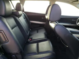 2015 Mazda CX-9 Grand Touring z VIN JM3TB3DV2F0456130, wystawiony jako Copart lot #60545095 z przebiegiem 120 892 mil mil oraz Szkoda całkowita • Salvage title. Historia ofert i sprzedaży dostępna na DreamBid. Obrazek 11.