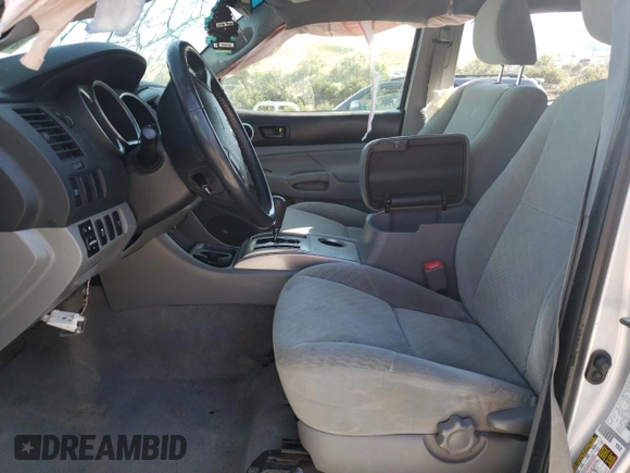 2010 Toyota Tacoma PreRunner with VIN 3TMJU4GN8AM095133, listed as a Copart auction lot 59602955 with 146,136 mi miles and Salvage title. Bid and sale history available at DreamBid. Image 7.