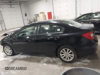 2012 Honda Civic EX with VIN 2HGFB2F81CH301455, listed as a IAAI auction lot 42008205 with 230,707 mi miles and . Bid and sale history available at DreamBid. Image 14.