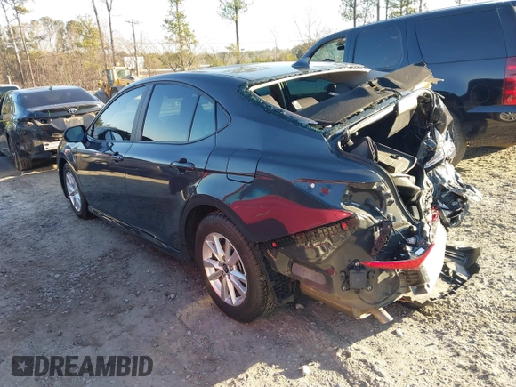 2025 Toyota Camry LE with VIN 4T1DAACK6SU013957, listed as a IAAI auction lot 41500800 with 31,414 mi miles and . Bid and sale history available at DreamBid. Image 3.