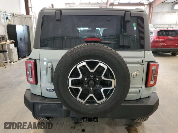 2022 Ford Bronco z VIN 1FMEE5DP8NLB90711, wystawiony jako Copart lot #63755395 z przebiegiem 22 660 mil mil oraz Szkoda całkowita • Salvage title. Historia ofert i sprzedaży dostępna na DreamBid. Obrazek 6.