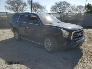 2019 GMC Yukon SLE with VIN 1GKS1AKC9KR166202, listed as a Copart auction lot 50103275 with 55,208 mi miles and Salvage Title. Bid and sale history available at carsss.com. Image 4.