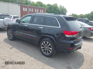 2017 Jeep Grand Cherokee Overland z VIN 1C4RJFCG4HC632929, wystawiony jako IAAI lot #42385321 z przebiegiem 205 593 mil mil oraz . Historia ofert i sprzedaży dostępna na DreamBid. Obrazek 3.