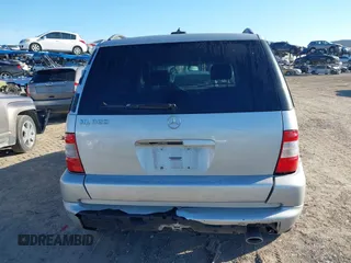 2003 Mercedes-Benz M-Class 3.2L with VIN 4JGAB54E03A383496, listed as a IAAI auction lot 41327756 with 162,973 mi miles. Bid and sale history available at carsss.com. Image 16.