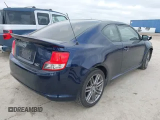 2012 Scion tC with VIN JTKJF5C77C3032626, listed as a IAAI auction lot 41774978 with 177,962 mi miles. Bid and sale history available at carsss.com. Image 4.
