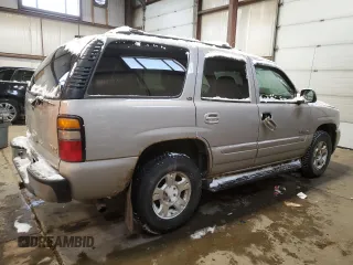 2006 GMC Yukon SLT with VIN 1GKEK13T76J149735, listed as a Copart auction lot 43025715 with 304,493 mi miles and Salvage Title. Bid and sale history available at carsss.com. Image 3.