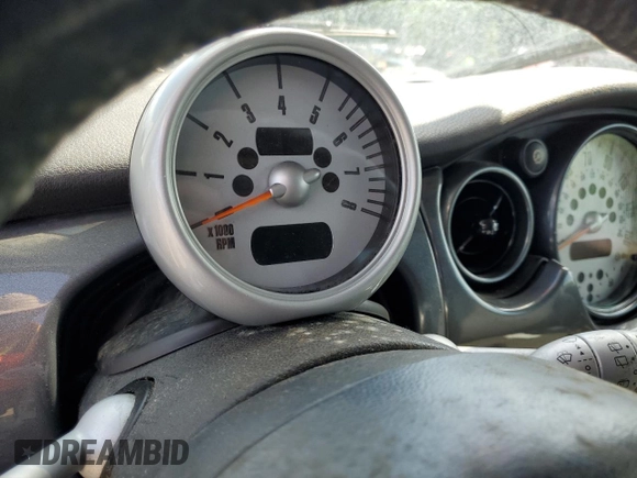 2005 MINI Hardtop с VIN WMWRC33495TJ66986, выставлен на аукционе Copart как лот 61852735 с пробегом Не указан миль и Списание • Salvage title. История ставок и продаж доступна на DreamBid. Изображение 9.