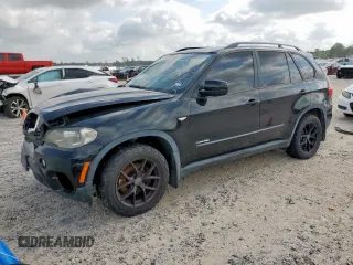 2013 BMW X5 xDrive35i z VIN 5UXZV4C50D0B12487, wystawiony jako Copart lot #57284255 z przebiegiem 209 408 mil mil oraz Czysty tytuł • Clean title. Historia ofert i sprzedaży dostępna na DreamBid. Obrazek 1.