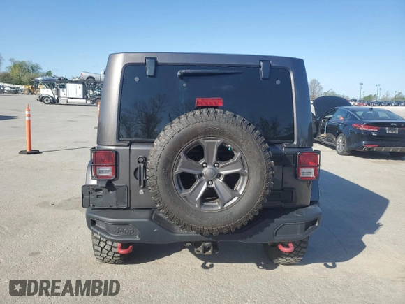 2017 Jeep Wrangler Unlimited Rubicon z VIN 1C4BJWFGXHL737844, wystawiony jako Copart lot #53044635 z przebiegiem 49 286 mil mil oraz Czysty tytuł • Clean title. Historia ofert i sprzedaży dostępna na DreamBid. Obrazek 6.