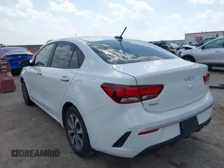 2023 Kia Rio S z VIN 3KPA24AD7PE550899, wystawiony jako IAAI lot #41882407 z przebiegiem 24 966 mil mil oraz . Historia ofert i sprzedaży dostępna na DreamBid. Obrazek 3.