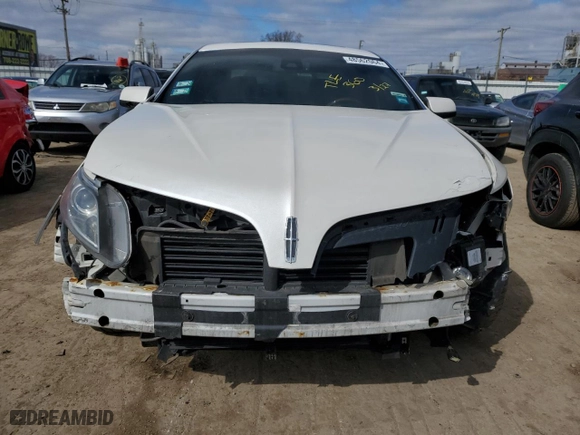 2014 Lincoln MKS with VIN 1LNHL9EK0EG609236, listed as a Copart auction lot 75507444 with 80,203 mi miles and Salvage Title. Bid and sale history available at carsss.com. Image 5.