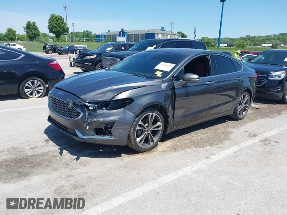 2020 Ford Fusion Titanium with VIN 3FA6P0K96LR173971, listed as a IAAI auction lot 42232469 with 82,474 mi miles and . Bid and sale history available at DreamBid. Image 18.