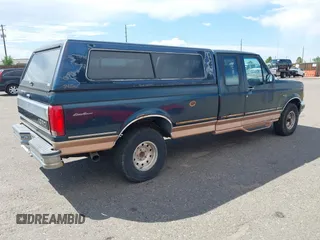 1995 Ford F-150 z VIN 1FTEX14H3SKA80389, wystawiony jako IAAI lot #42686705 z przebiegiem 192 784 mil mil oraz . Historia ofert i sprzedaży dostępna na DreamBid. Obrazek 4.
