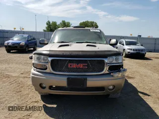 2003 GMC Sierra Denali z VIN 2GTFK69U831158334, wystawiony jako Copart lot #66320714 z przebiegiem Nie podano mil oraz Szkody całkowita. Historia ofert i sprzedaży dostępna na DreamBid. Obrazek 5.