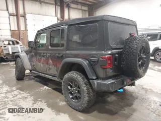 2024 Jeep Wrangler Sport S with VIN 1C4RJXN64RW162895, listed as a IAAI auction lot 42217515 with 8,442 mi miles and . Bid and sale history available at DreamBid. Image 3.