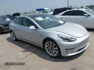 2018 Tesla Model 3 Long Range Battery with VIN 5YJ3E1EAXJF060683, listed as a IAAI auction lot 41925387 with 155,532 mi miles. Bid and sale history available at carsss.com. Image 1.