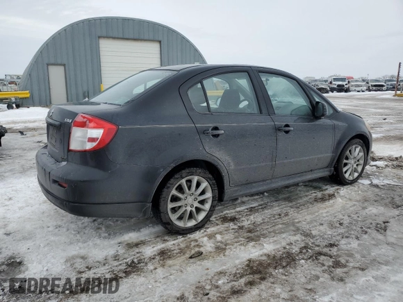 2011 Suzuki SX4 with VIN JS2YC5A44B6300171, listed as a Copart auction lot 87673685 with 116,483 mi miles and Salvage Title. Bid and sale history available at DreamBid. Image 3.