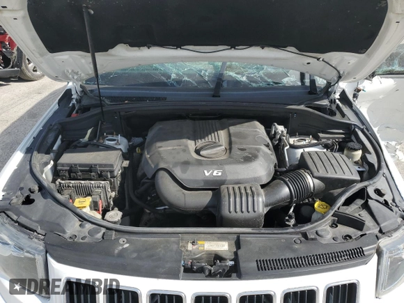 2014 Jeep Grand Cherokee Limited with VIN 1C4RJFBGXEC325357, listed as a Copart auction lot 61993715 with 156,718 mi miles and Salvage title. Bid and sale history available at DreamBid. Image 12.