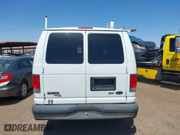 2014 Ford Econoline Cargo Commercial with VIN 1FTNE1EW3EDA92098, listed as a IAAI auction lot 41985717 with 236,117 mi miles and . Bid and sale history available at DreamBid. Image 16.