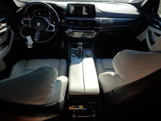 2020 BMW M5 Competition with VIN WBSJF0C01LCD36012, listed as a Copart auction lot 86910424 with 33,912 mi miles and Salvage Title. Bid and sale history available at carsss.com. Image 8.