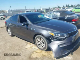 2017 Kia Optima LX z VIN KNAGT4L30H5170762, wystawiony jako IAAI lot #42154159 z przebiegiem 96 243 mil mil oraz . Historia ofert i sprzedaży dostępna na DreamBid. Obrazek 1.