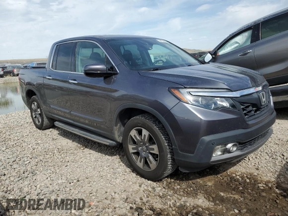 2017 Honda Ridgeline RTL-E with VIN 5FPYK3F75HB025743, listed as a Copart auction lot 54791905 with 163,055 mi miles and Salvage title. Bid and sale history available at DreamBid. Image 4.