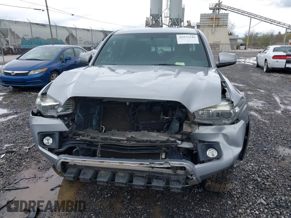 2016 Toyota Tacoma SR with VIN 5TFCZ5AN5GX026458, listed as a IAAI auction lot 41975246 with 208,401 mi miles and . Bid and sale history available at DreamBid. Image 12.