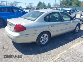 2003 Ford Taurus SE Standard with VIN 1FAFP53U33A228466, listed as a IAAI auction lot 41973883 with 46,377 mi miles. Bid and sale history available at carsss.com. Image 4.