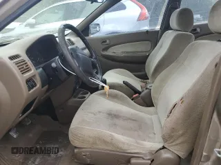 1997 Mazda Protege DX z VIN JM1BC1414V0103244, wystawiony jako Copart lot #56219745 z przebiegiem Nie podano mil oraz Szkoda całkowita • Salvage title. Historia ofert i sprzedaży dostępna na DreamBid. Obrazek 7.
