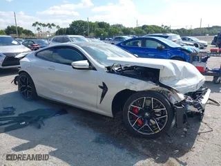 2022 BMW M8 Competition with VIN WBSAE0C02NCH10522, listed as a IAAI auction lot 41321013 with 44,389 mi miles. Bid and sale history available at carsss.com. Image 1.