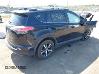 2018 Toyota RAV4 XLE with VIN 2T3WFREVXJW484872, listed as a IAAI auction lot 42144810 with Not provided miles and . Bid and sale history available at DreamBid. Image 4.