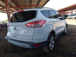 2015 Ford Escape SE with VIN 1FMCU0G96FUA17954, listed as a IAAI auction lot 41979961 with 86,310 mi miles. Bid and sale history available at carsss.com. Image 4.