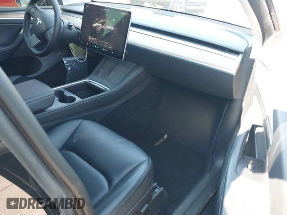 2022 Tesla Model Y Long Range z VIN 7SAYGDEE4NF522698, wystawiony jako IAAI lot #41287885 z przebiegiem 82 306 mil mil oraz . Historia ofert i sprzedaży dostępna na DreamBid. Obrazek 5.
