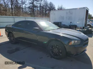 2014 Dodge Charger SXT with VIN 2C3CDXJG7EH320476, listed as a Copart auction lot 49823735 with 125,067 mi miles and Clean Title. Bid and sale history available at carsss.com. Image 4.