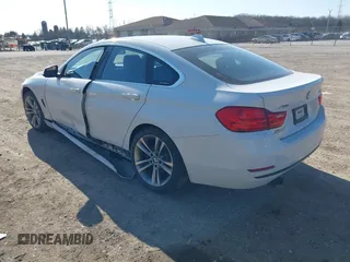 2016 BMW 4 Series 428i xDrive with VIN WBA4C9C59GG138090, listed as a IAAI auction lot 41560267 with 94,010 mi miles and . Bid and sale history available at carsss.com. Image 3.