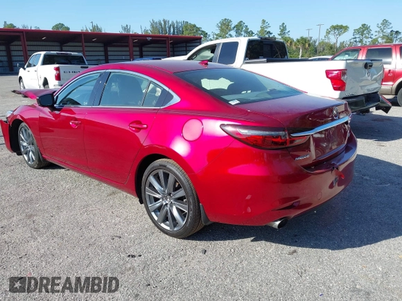 2018 Mazda 6 Grand Touring with VIN JM1GL1TY1J1302146, listed as a IAAI auction lot 41788881 with 55,852 mi miles and . Bid and sale history available at DreamBid. Image 3.