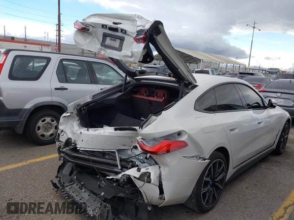 2023 BMW i4 eDrive40 z VIN WBY73AW05PFR28279, wystawiony jako IAAI lot #41262952 z przebiegiem 40 011 mil mil oraz . Historia ofert i sprzedaży dostępna na DreamBid. Obrazek 22.
