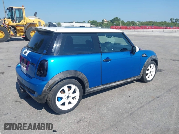 2009 MINI Hardtop S with VIN WMWMF73539TT95350, listed as a IAAI auction lot 42196663 with 75,593 mi miles and . Bid and sale history available at DreamBid. Image 4.