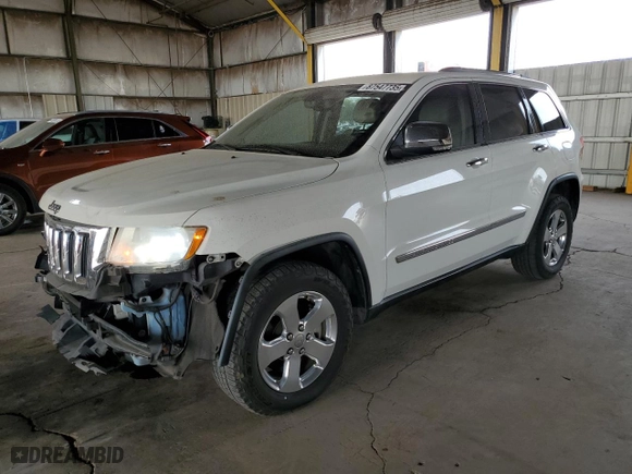 2012 Jeep Grand Cherokee Limited with VIN 1C4RJFBTXCC189998, listed as a Copart auction lot 87547735 with 207,167 mi miles and Salvage Title. Bid and sale history available at carsss.com. Image 1.