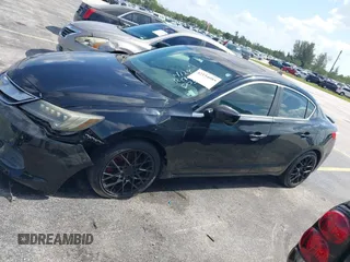 2016 Acura ILX z VIN 19UDE2F38GA005372, wystawiony jako IAAI lot #42154085 z przebiegiem Nie podano mil oraz . Historia ofert i sprzedaży dostępna na DreamBid. Obrazek 13.