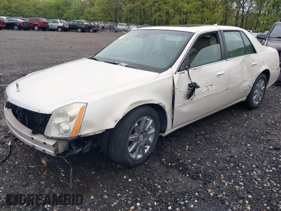2010 Cadillac DTS 1SD z VIN 1G6KH5EYXAU121435, wystawiony jako IAAI lot #42175287 z przebiegiem Nie podano mil oraz . Historia ofert i sprzedaży dostępna na DreamBid. Obrazek 2.
