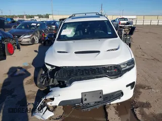 2023 Dodge Durango R/T Plus with VIN 1C4SDHCT5PC589797, listed as a IAAI auction lot 41472148 with 34,980 mi miles and . Bid and sale history available at DreamBid. Image 12.
