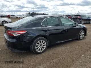 2019 Toyota Camry LE with VIN 4T1B11HK2KU171616, listed as a Copart auction lot 54007115 with 123,285 mi miles and Clean Title. Bid and sale history available at carsss.com. Image 3.
